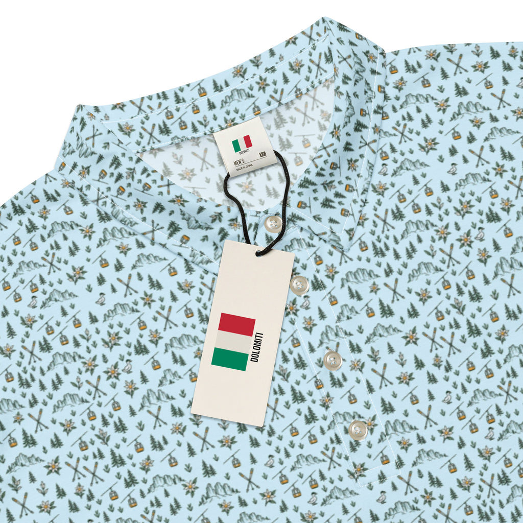 Golf polo with small all-over Dolomites print: peaks, pines, cable cars and skis